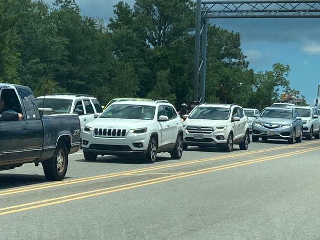 Drivers sit in traffic on U.S. 421 near Leland around 1 p.m. on Saturday, June 29, 2024. Several roads in Brunswick and New Hanover counties remain closed due to an ongoing hazmat situation.